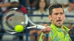 DUBAI, UNITED ARAB EMIRATES - MARCH 03: Novak Djokovic of Serbia competes with Daniil Medvedev of Russia (not seen) during men's single quarter final match of Dubai Duty Free Tennis Championship in Dubai, United Arab Emirates on March 03, 2023. (Photo by Waleed Zein/Anadolu Agency via Getty Images)