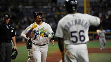 ST PETERSBURG, FLORIDA - AUGUST 11: Isaac Paredes #17 of the Tampa Bay Rays is congratulated by Randy Arozarena #56 after Paredes hit a two-run go-ahead homer against the Cleveland Guardians at Tropicana Field on August 11, 2023 in St Petersburg, Florida.   Mark Taylor/Getty Images/AFP (Photo by MARK TAYLOR / GETTY IMAGES NORTH AMERICA / Getty Images via AFP)