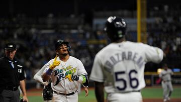 ST PETERSBURG, FLORIDA - AUGUST 11: Isaac Paredes #17 of the Tampa Bay Rays is congratulated by Randy Arozarena #56 after Paredes hit a two-run go-ahead homer against the Cleveland Guardians at Tropicana Field on August 11, 2023 in St Petersburg, Florida.   Mark Taylor/Getty Images/AFP (Photo by MARK TAYLOR / GETTY IMAGES NORTH AMERICA / Getty Images via AFP)