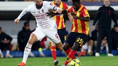 LECCE, ITALY - JANUARY 14: Samuel Umtiti of Lecce competes for the ball with Olivier Giroud of Milan during the Serie A match between US Lecce and AC MIlan at Stadio Via del Mare on January 14, 2023 in Lecce, Italy. (Photo by Maurizio Lagana/Getty Images)