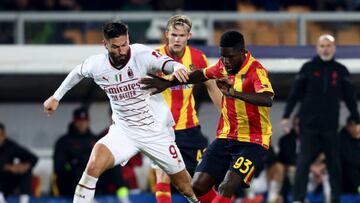 LECCE, ITALY - JANUARY 14: Samuel Umtiti of Lecce competes for the ball with Olivier Giroud of Milan during the Serie A match between US Lecce and AC MIlan at Stadio Via del Mare on January 14, 2023 in Lecce, Italy. (Photo by Maurizio Lagana/Getty Images)