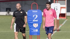 Comesa&ntilde;a, junto a Paco en un entrenamiento.