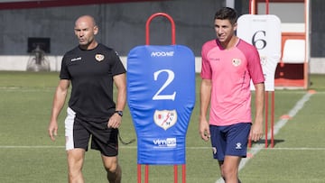 Comesa&ntilde;a, junto a Paco en un entrenamiento.