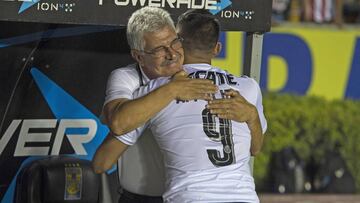 Alan Pulido y Ricardo Ferretti