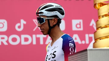 Ineos Grenadiers' Colombian rider Egan Bernal walks past the Giro d'Italia trophy (�trofeo senza fine�) prior to the first stage of the 108th Giro d'Italia cycling race, 160km from Durres to Tirana in Albania, on May 9, 2025. (Photo by Luca Bettini / AFP)