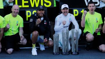 Formula One F1 - Azerbaijan Grand Prix - Baku City Circuit, Baku, Azerbaijan - April 28, 2019 Mercedes' Valtteri Bottas celebrates winning the race with second placed Lewis Hamilton and team mates REUTERS/Anton Vaganov