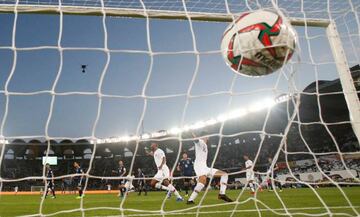 Qatar's Almoez Ali celebrates scoring their first goal with team mates