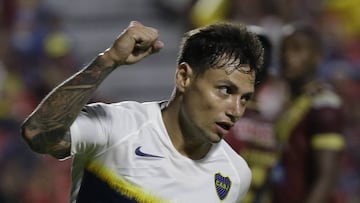 Mauro Zarate of Argentina's Boca Juniors, right, celebrates after scoring a goal during a Copa Libertadores soccer game against Colombia's Deportes Tolima in Ibague, Colombia, Wednesday, April 24, 2019. (AP Photo/Fernando Vergara)