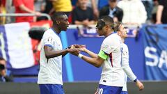 France's forward #12 Randal Kolo Muani and France's forward #10 Kylian Mbappe (C) celebrate the first goal during the UEFA Euro 2024 round of 16 football match between France and Belgium at the Duesseldorf Arena in Duesseldorf on July 1, 2024. (Photo by FRANCK FIFE / AFP)