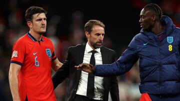 LONDON, ENGLAND - SEPTEMBER 26: Gareth Southgate, Manager of England shakes hands with Harry Maguire following during the UEFA Nations League League A Group 3 match between England and Germany at Wembley Stadium on September 26, 2022 in London, England. (Photo by Eddie Keogh - The FA/The FA via Getty Images)