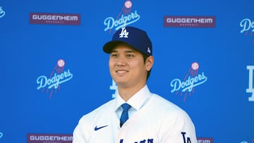Los Angeles Dodgers' designated hitter, Shohei Ohtani, is introduced at a press conference at Dodger Stadium.