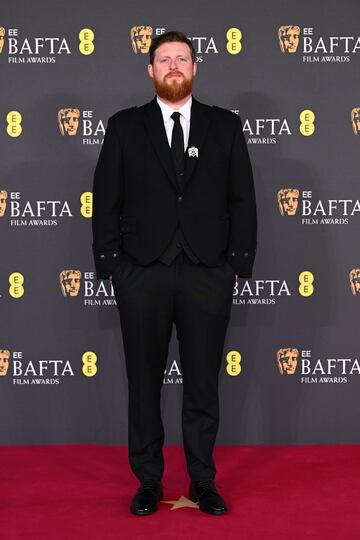 Robin Carolan posa en la alfombra roja de los premios BAFTA 2025 celebrados en el Royal Festival Hall del Southbank Centre de Londres.