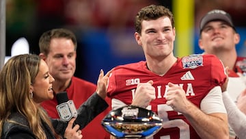 Jan 9, 2026; Atlanta, GA, USA; Indiana Hoosiers quarterback Fernando Mendoza (15) reacts after the 2025 Peach Bowl and semifinal game of the College Football Playoff at Mercedes-Benz Stadium. Mandatory Credit: Dale Zanine-Imagn Images