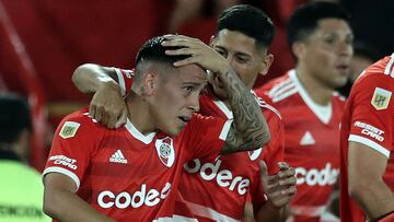 River Plate's midfielder Esequiel Barco (L) celebrates with teammates after scoring his team's thrid goal against Huracan during an Argentina's Professional Football League match at the Tomas Duco stadium, in Buenos Aires, on April 9, 2023. (Photo by Alejandro PAGNI / AFP)