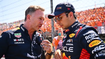 Horner y Pérez hablan en la parrilla del GP de Hungría 2023.