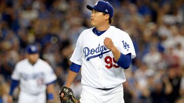 Oct 4, 2018; Los Angeles, CA, USA; Los Angeles Dodgers starting pitcher Hyun-Jin Ryu (99) reacts after striking out Atlanta Braves second baseman Ozzie Albies (1) during the seventh inning in game one of the 2018 NLDS playoff baseball series at Dodger Sta