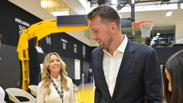 Aug 2, 2025; El Segundo, CA, USA; Los Angeles Lakers Luka Doncic (77) talks with team co-owner Jeanie Buss following a press conference announcing the signing of a 3-year, $165 million contract extension at UCLA Health Training Center. Mandatory Credit: Jayne Kamin-Oncea-Imagn Images
