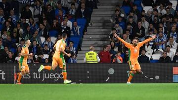 Real Betis' Spanish forward Borja Iglesias (R) celebrates with teammates scoring his team's second goal during the Spanish league football match between Real Sociedad and Real Betis, at the Reale Arena stadium in San Sebastian on October 30, 2022. (Photo by ANDER GILLENEA / AFP) (Photo by ANDER GILLENEA/AFP via Getty Images)