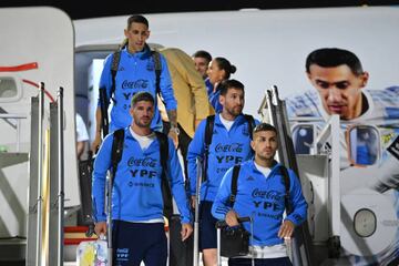 DOHA, QATAR - NOVEMBER 17: Lionel Messi (2ndR) of Argentina disembarks the airplane at Hamad International Airport ahead of FIFA World Cup Qatar 2022 at  on November 17, 2022 in Doha, Qatar. (Photo by Justin Setterfield/Getty Images)