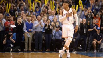 Apr 4, 2017; Oklahoma City, OK, USA; Oklahoma City Thunder guard Russell Westbrook (0) reacts as it announced that he has tied the season triple double record in action against the Milwaukee Bucks at Chesapeake Energy Arena. Mandatory Credit: Mark D. Smith-USA TODAY Sports