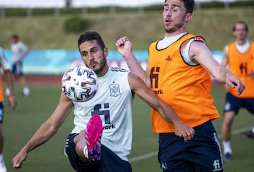 Koke y Aymeric Laporte.