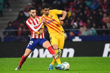 Mario Hermoso y Luis Suárez.