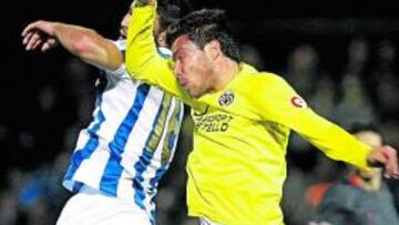 <b>MUCHA PELEA. </b>Amarillos y onubenses empataron un choque que pudo ganar cualquiera.