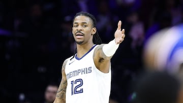 (FILES) In this file photo taken on February 23, 2023, Ja Morant of the Memphis Grizzlies reacts during the second quarter against the Philadelphia 76ers in Philadelphia, Pennsylvania. NOTE TO USER: User expressly acknowledges and agrees that, by downloading and or using this photograph, User is consenting to the terms and conditions of the Getty Images License Agreement.   Tim Nwachukwu/Getty Images/AFP - Morant was suspended by his team for at least two games on March 4, 2023, after posting a video where he appeared to display a gun in a nightclub. The Grizzlies issued a statement saying that Morant "will be away from the team for at least the next two games". (Photo by Tim Nwachukwu / GETTY IMAGES NORTH AMERICA / AFP)