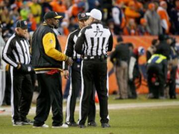 DENVER, CO - JANUARY 17: Head coach Mike Tomlin of the Pittsburgh Steelers argues a call with the referees against the Denver Broncos during the AFC Divisional Playoff Game at Sports Authority Field at Mile High on January 17, 2016 in Denver, Colorado.   