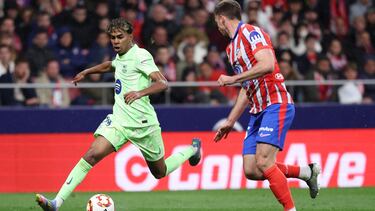 Barcelona's Spanish forward #19 Lamine Yamal is challenged by Atletico Madrid's French defender #15 Clement Lenglet (R) during the Spanish Copa del Rey (King's Cup) semi-final second leg football match between Club Atletico de Madrid and FC Barcelona at Metropolitano Stadium in Madrid on April 2, 2025. (Photo by Thomas COEX / AFP)