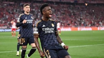 Real Madrid's Brazilian forward #07 Vinicius Junior celebrates scoring a penalty during the UEFA Champions League semi-final first leg football match between FC Bayern Munich and Real Madrid CF on April 30, 2024 in Munich, southern Germany. (Photo by Kirill KUDRYAVTSEV / AFP)