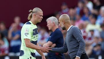 Soccer Football - Premier League - West Ham United v Manchester City - London Stadium, London, Britain - August 7, 2022 Manchester City's Erling Braut Haaland shakes hands with manager Pep Guardiola after being substituted off Action Images via Reuters/Peter Cziborra EDITORIAL USE ONLY. No use with unauthorized audio, video, data, fixture lists, club/league logos or 'live' services. Online in-match use limited to 75 images, no video emulation. No use in betting, games or single club /league/player publications. Please contact your account representative for further details.