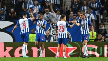 PORTO, PORTUGAL - OCTOBER 04: Galeno of FC Porto celebrates with teammate Mehdi Taremi after scoring their team's second goal during the UEFA Champions League group B match between FC Porto and Bayer 04 Leverkusen at Estadio do Dragao on October 04, 2022 in Porto, Portugal. (Photo by Octavio Passos/Getty Images)