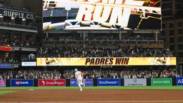 July 5, 2024; San Diego, California, USA; San Diego Padres third baseman Manny Machado (13) rounds the bases after hititng a walk-off home run during the ninth inning against the Arizona Diamondbacks at Petco Park. Mandatory Credit: Denis Poroy-USA TODAY Sports