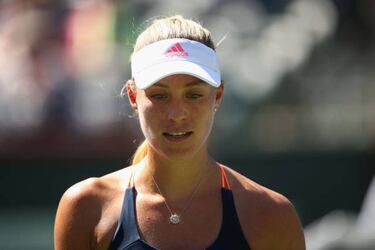 Halep and Radwanska out as Kerber battles through