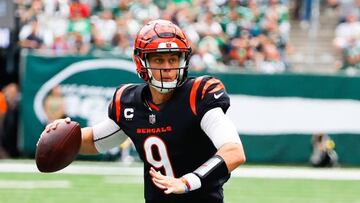 EAST RUTHERFORD, NJ - SEPTEMBER 25:  Cincinnati Bengals quarterback Joe Burrow (9) rolls out during the second quarter of the National Football League game between the New York Jets and the Cincinnati Bengals on September 25, 2022 at MetLife Stadium in East Rutherford, New Jersey.  (Photo by Rich Graessle/Icon Sportswire via Getty Images)