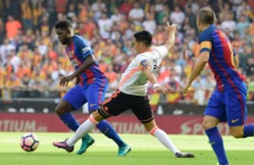 Umtiti y Enzo Pérez.