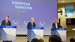 HANDOUT - 20 May 2020, Belgium, Brussels: (L-R) European Commission Vice-President in charge of the Euro, Social Dialogue, Financial Stability, Financial Services and Capital Markets Union Valdis Dombrovskis, EU commissioner for Economy Paolo Gentiloni an