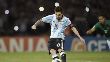 Argentina&#039;s Lionel Messi takes a penalty to score against Bolivia during the Russia 2018 FIFA World Cup South American Qualifiers&#039; football match in Cordoba, Argentina, on March 29, 2016.    AFP PHOTO / JUAN MABROMATA