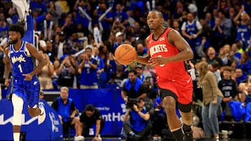 Jae'Sean Tate #8 of the Houston Rockets brings the ball up the floor