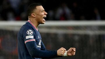 Paris Saint-Germain&#039;s French forward Kylian Mbappe celebrates after winning the UEFA Champions League round of 16 first leg football match between Paris Saint-Germain (PSG) and Real Madrid at the Parc des Princes stadium in Paris on February 15, 2022