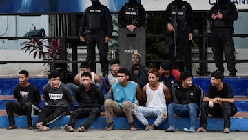 Police officers present the detainees who stormed the TC Television studio during a live TV broadcast amid the ongoing wave of violence around the nation, in Guayaquil, Ecuador January 10, 2024. REUTERS/Vicente Gaibor del Pino     TPX IMAGES OF THE DAY