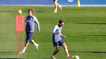 Griezmann y Koke en la sesión de entrenamiento del Atlético.