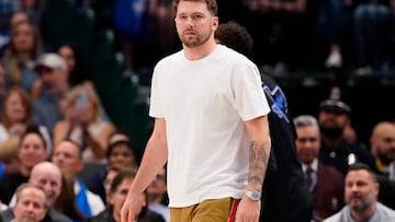 DALLAS, TEXAS - APRIL 12: Luka Doncic #77 of the Dallas Mavericks looks on during the second half against the Detroit Pistons at American Airlines Center on April 12, 2024 in Dallas, Texas. NOTE TO USER: User expressly acknowledges and agrees that, by downloading and or using this photograph, User is consenting to the terms and conditions of the Getty Images License Agreement.   Sam Hodde/Getty Images/AFP (Photo by Sam Hodde / GETTY IMAGES NORTH AMERICA / Getty Images via AFP)