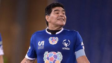 (FILES) This file photo taken on October 12, 2016 shows Argentinian football legend Diego Armando Maradona during the 'Match of Peace - United for Peace' charity football match promoted by the Schools for Encounter foundation at the Olympic stadium in Rome on October 12, 2016. Diego Maradona, accused of tax fraud by the Italian Treasury, says that he owes "nothing", in an interview published on October 19, 2016 in the Corriere della Sera newspaper. / AFP PHOTO / FILIPPO MONTEFORTE