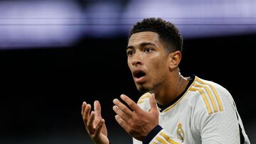 Real Madrid's English midfielder #5 Jude Bellingham reacts during the Spanish league football match between Real Madrid CF and Granada FC at the Santiago Bernabeu stadium in Madrid on December 1, 2023. (Photo by OSCAR DEL POZO / AFP)