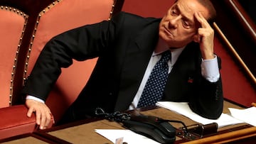 FILE PHOTO: Italian center-right leader Silvio Berlusconi looks on at the Senate in Rome, Italy, October 2, 2013. REUTERS/Tony Gentile/File Photo