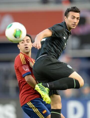 Stephen Kelly y Xavi.