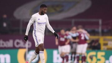 Soccer Football - Premier League - Burnley v Leicester City - Turf Moor, Burnley, Britain - March 3, 2021 Leicester City's Kelechi Iheanacho looks dejected as Burnley's Matej Vydra celebrates scoring their first goal with teammates Pool via REUT