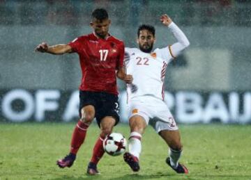 Football Soccer - Albania v Spain - World Cup 2018 Qualifiers - Loro Borici Stadium, Shkoder, Albania -9/10/16. Albania's Naser Aliji (L) and Spain's Isco in action. REUTERS/Antonio Bronic